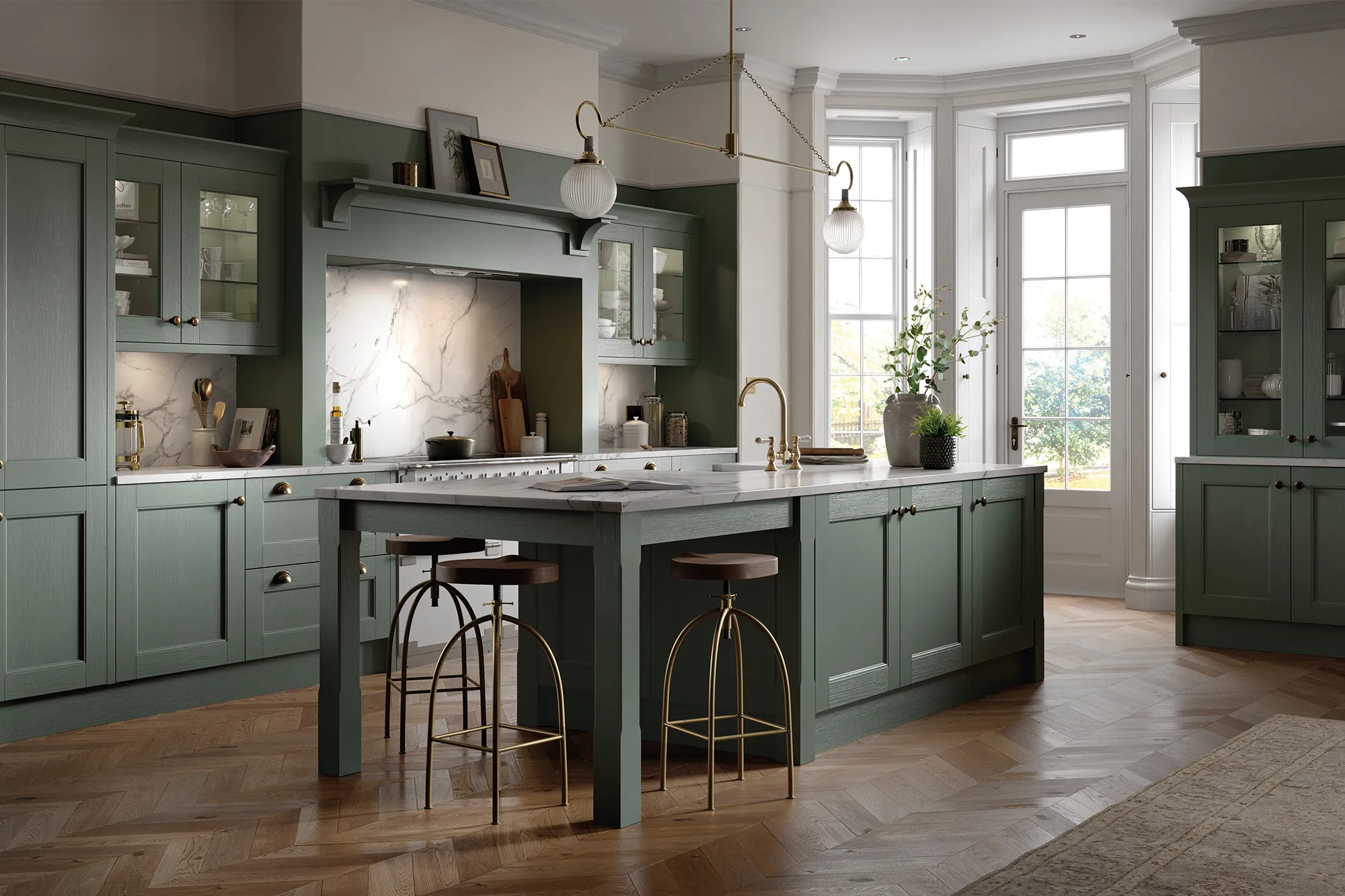 a kitchen with green cabinets and wooden floors